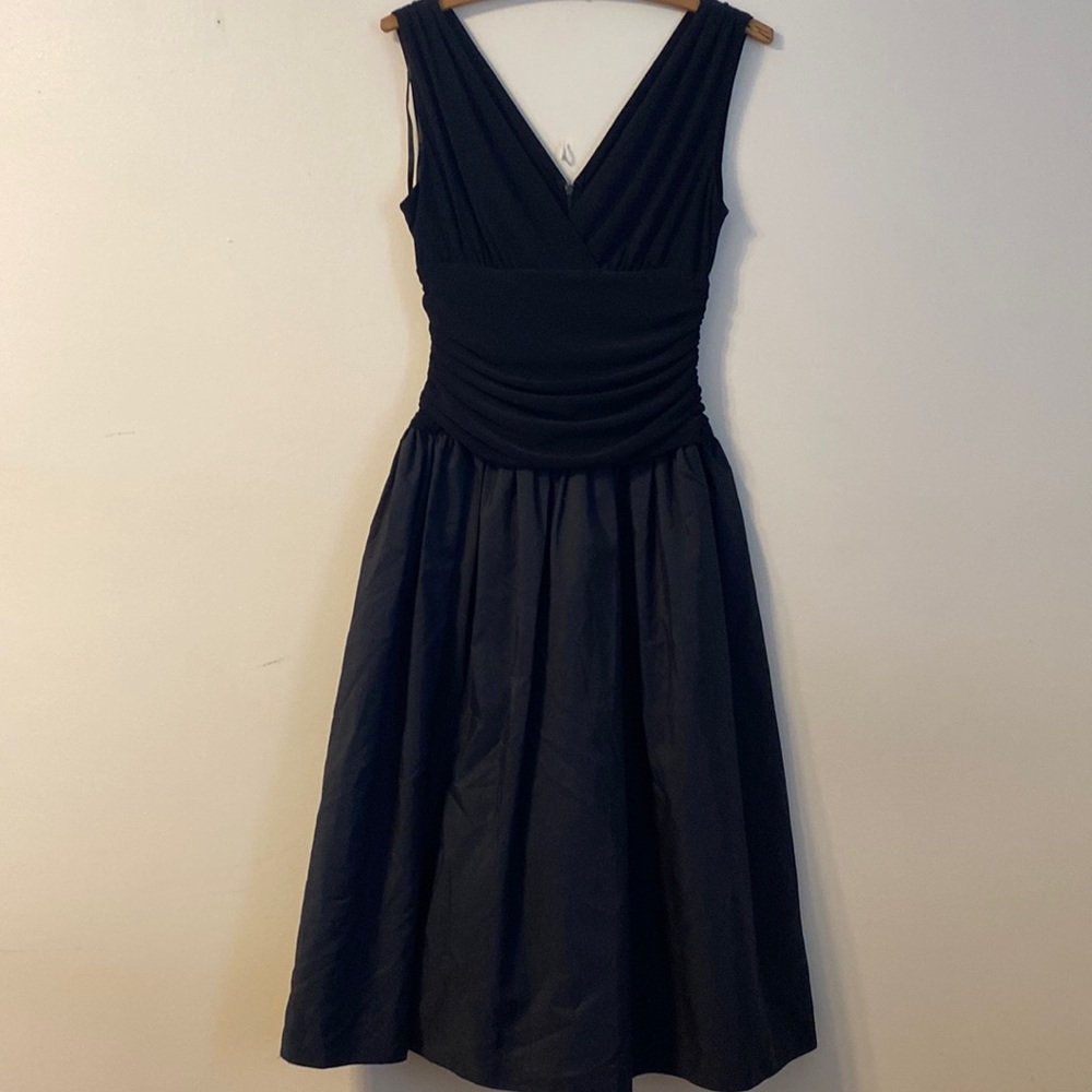 Women’s casual or formal black dress. Can be worn dressed up or just a night out